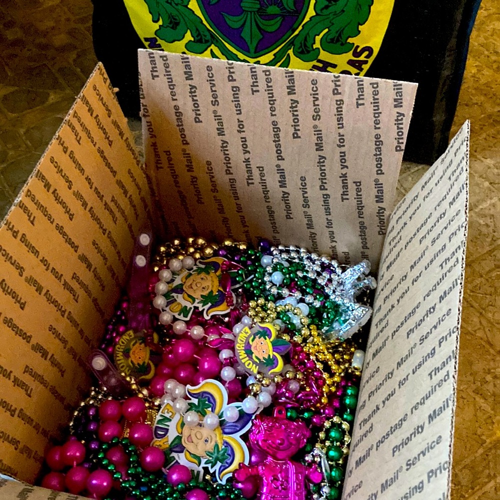 A fun mix of beads and Mardi Gras stuff